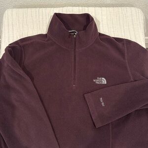 The North Face women’s plum/purple pullover in size medium. Gently used!